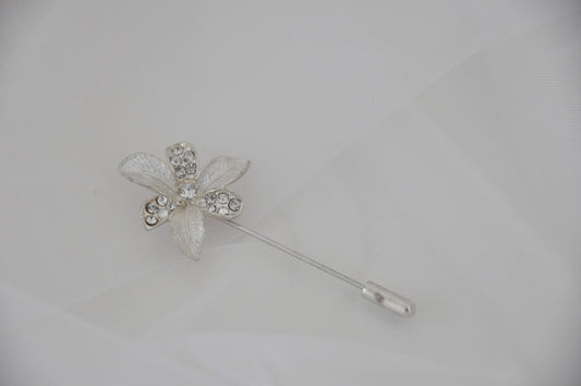 Boutonnière flor metálica